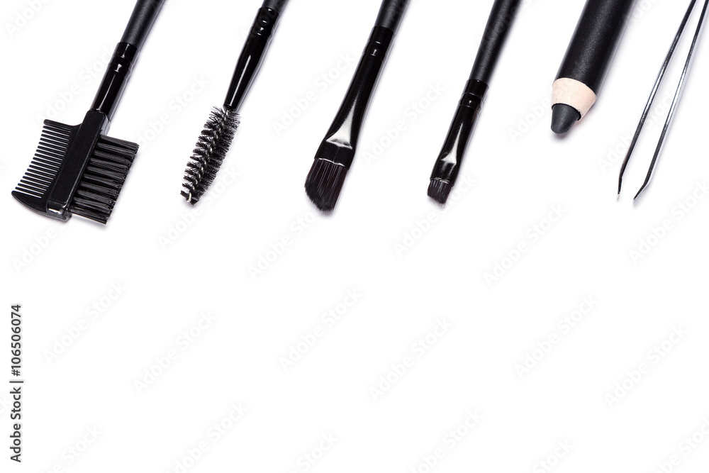 Eyebrow grooming tools on white background Eyebrow grooming tools on white background