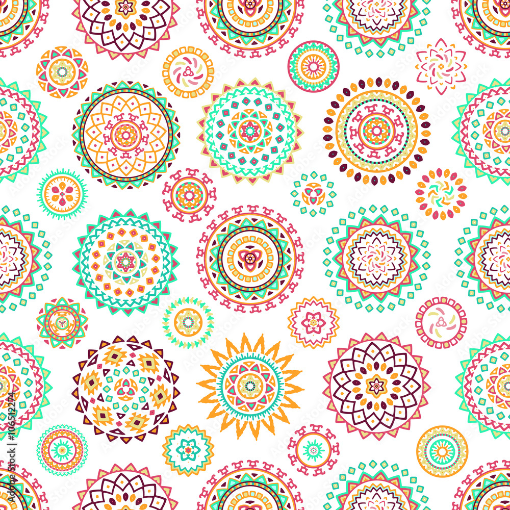Seamless pattern of bright colorful geometric round ethnic decorative elements. Vector mandala background with bohemian, Oriental, Indian, Arabic, Aztec motifs.