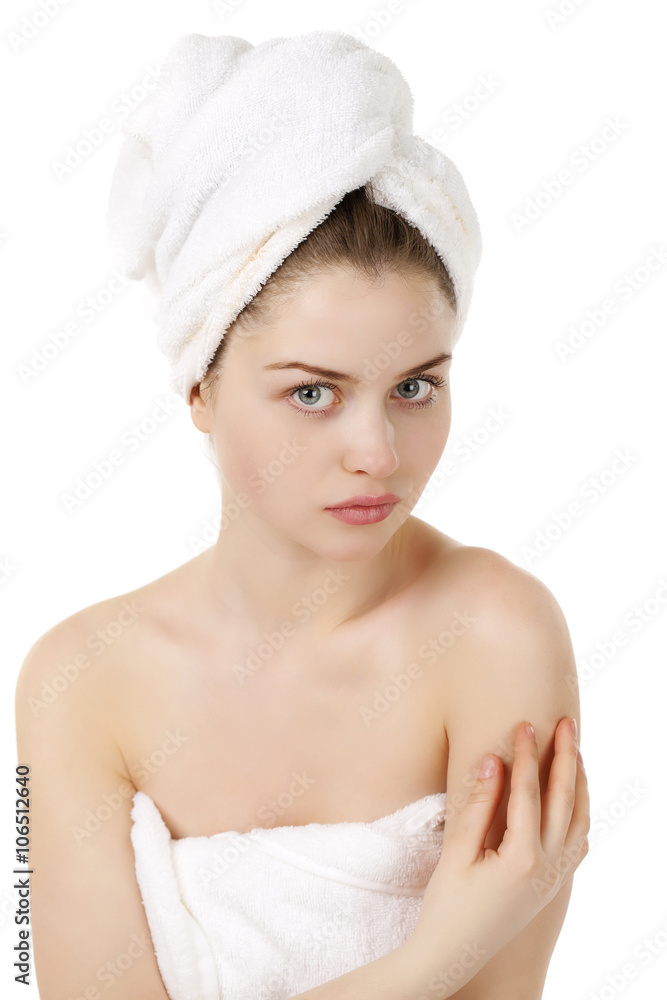 Beautiful young woman posing in white towel Beautiful young woman posing in white towel