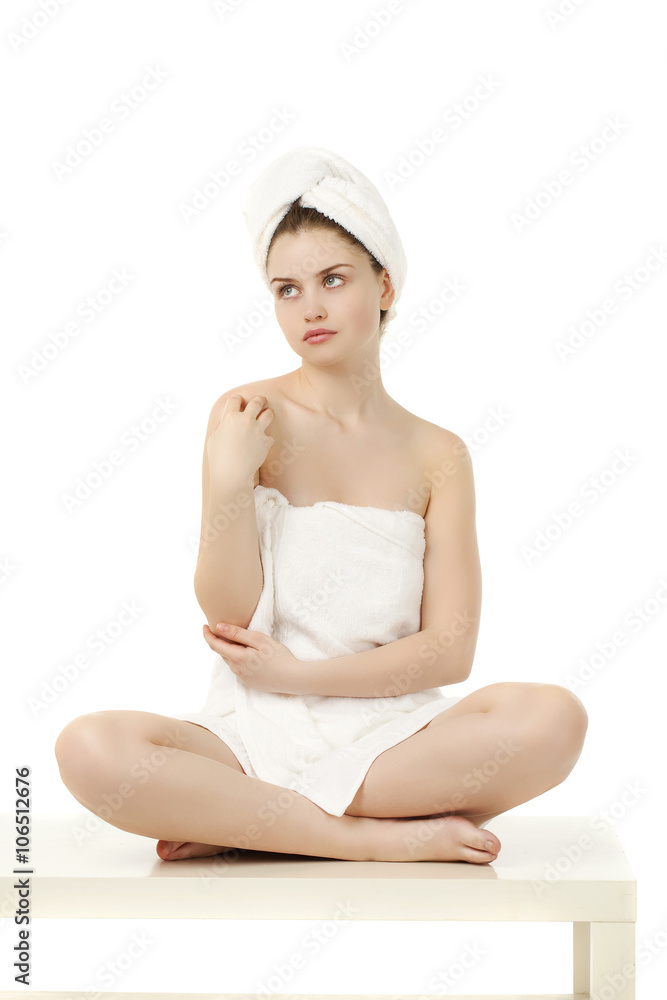 Young woman wrapped towel isolated on white background Young woman wrapped towel isolated on white background