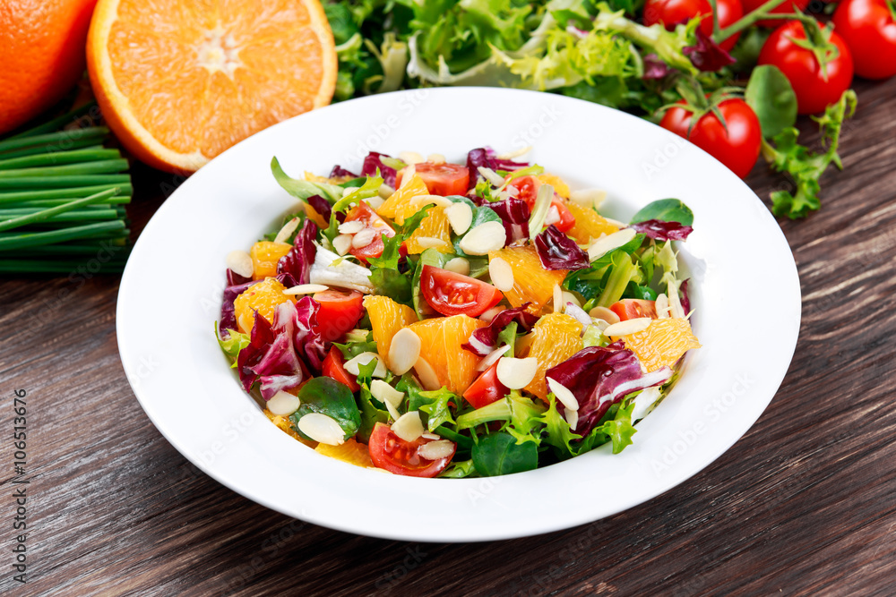 Fresh Orange, vegetables salad. on wooden table. Fresh Orange, vegetables salad. on wooden table.