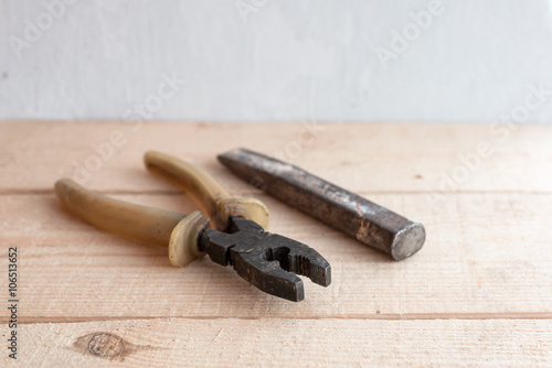 old tools on a wooden table 