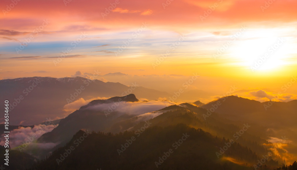 Mountain sunset autumn. Sunny rays