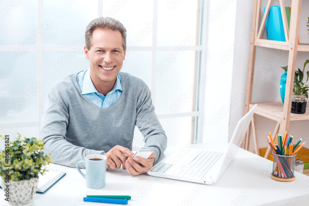 Adult businessman while working day Adult businessman while working day