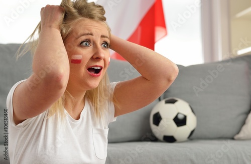 Obraz na płótnie Polish fan cheers football team in the national colors. w salonie
