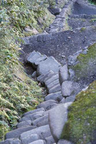 Stairs climbing Machu Picchu peak in Peru