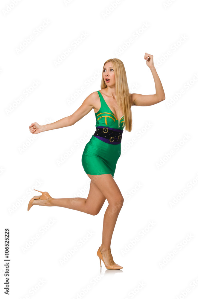 Tall model in mini green dress isolated on white