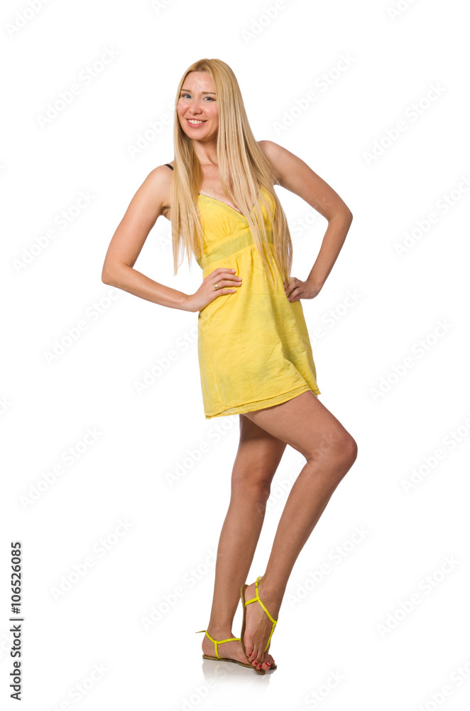 Caucasian fair model in yellow summer dress isolated on white Caucasian fair model in yellow summer dress isolated on white