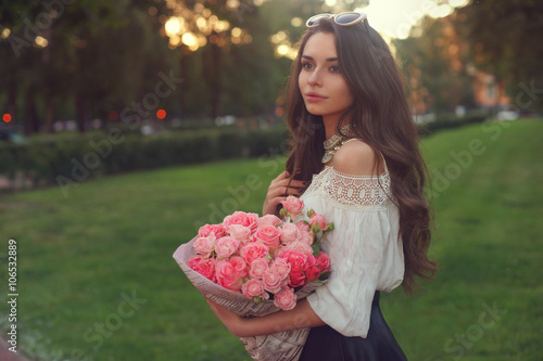 girl with pink roses