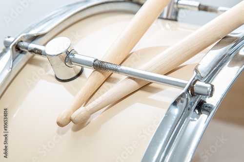 Wood snare drum and drumsticks isolated