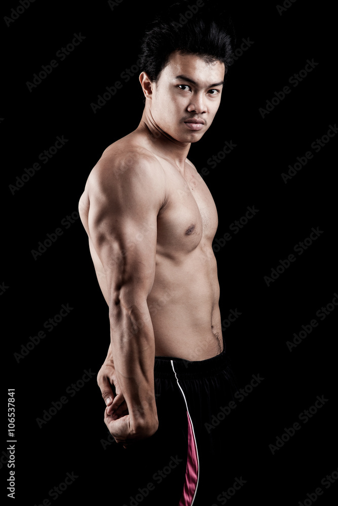 Fototapeta premium Muscular Asian man show his body