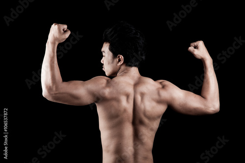Muscular Asian man show his body