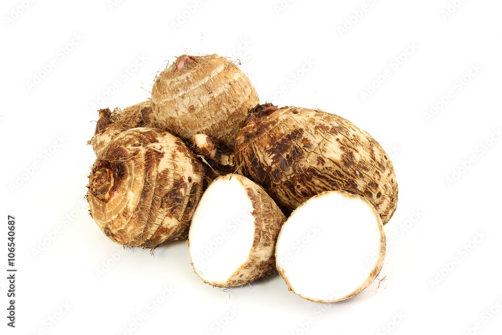 Taro root or eddoes root isolated on white background Taro root or eddoes root isolated on white background
