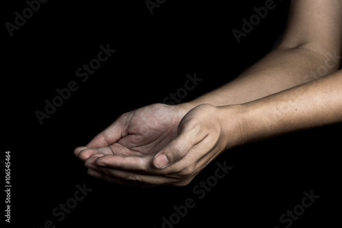 open hand on black background