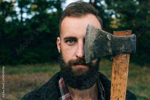Cuadro en lienzo Portrait brutal bearded and moustached woodcutter hipster Gypsy man in the fores