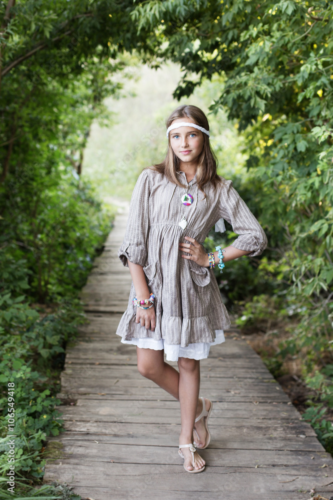 beautiful girl on old wooden bridge in forest beautiful girl on old wooden bridge in forest