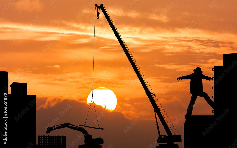 silhouette of construction foreman worker controlling the excava