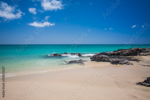 Amazing sandy beach and blue ocean in Fuereventua  Canary Island  Spain