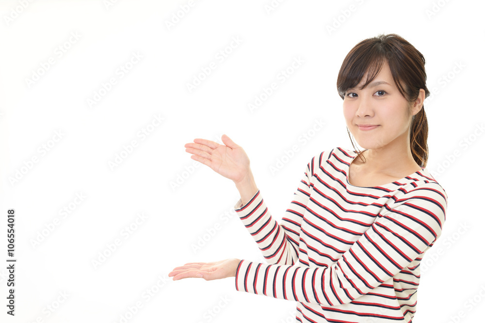 案内する笑顔の女性 案内する笑顔の女性