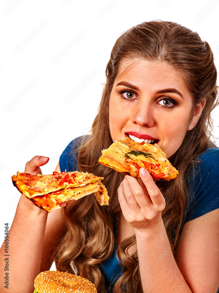 Young beautiful woman eating few slices of pizza. Fastfood concept. Isolated. Young beautiful woman eating few slices of pizza. Fastfood concept. Isolated.