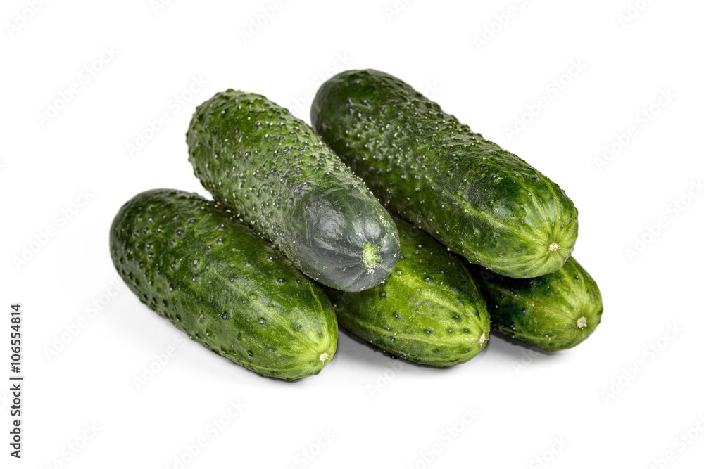 Cucumber and slices isolated over white background Cucumber and slices isolated over white background