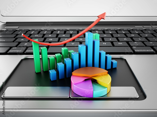 Obraz na płótnie Financial charts standing on laptop computer