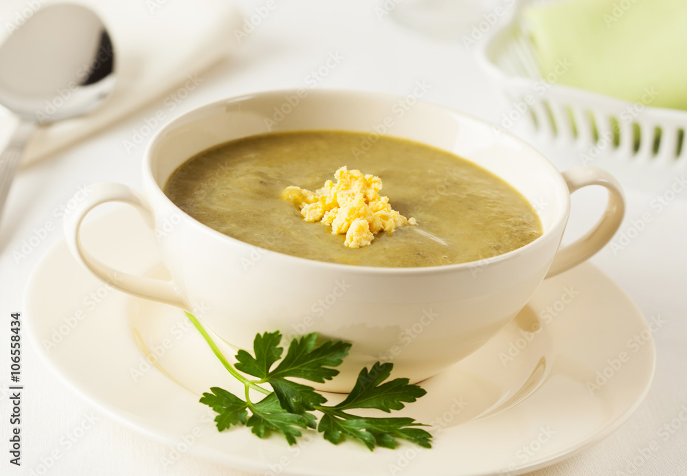 Homemade fresh spinach cream soup in a bowl Homemade fresh spinach cream soup in a bowl