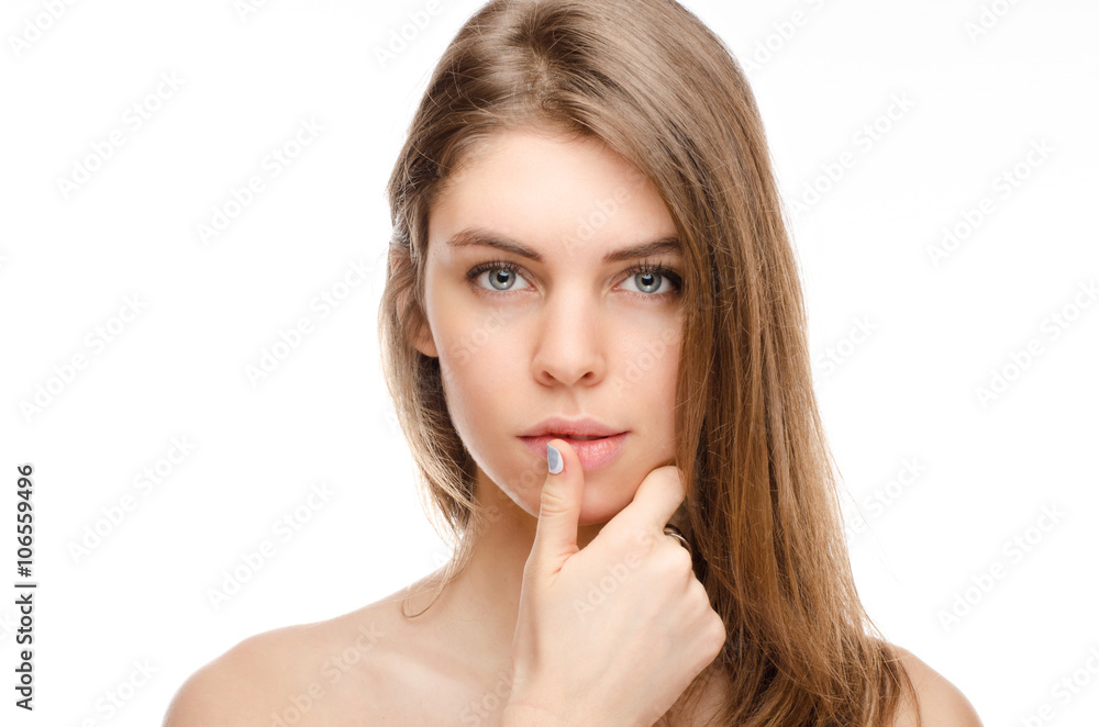 Portrait of beautiful young woman with clean face. High key shot. Portrait of beautiful young woman with clean face. High key shot.