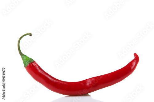 hot red chili with green tail on a white isolated background