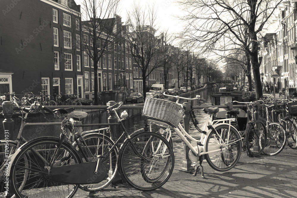 Amsterdam,old traditional building in Amsterdam with bicycles. Amsterdam,old traditional building in Amsterdam with bicycles.