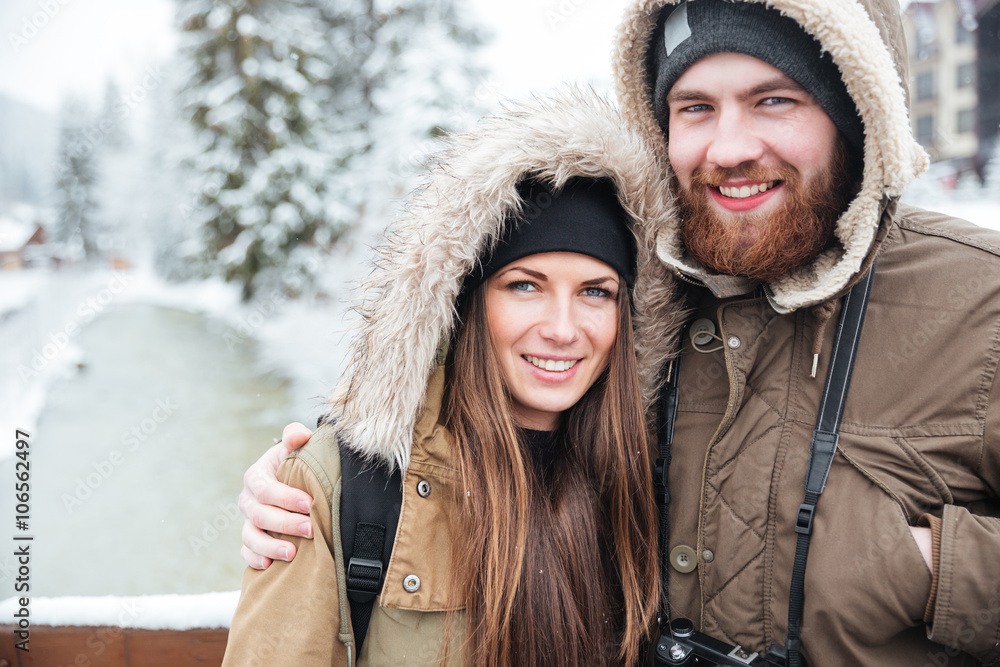 Couple standing together in winter Couple standing together in winter