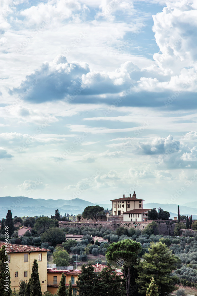 Tuscan country, rural scene, clouds, houses and greenery