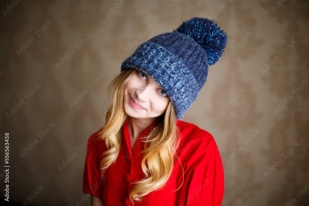 Portrait of playful woman in knitted winter cap Portrait of playful woman in knitted winter cap