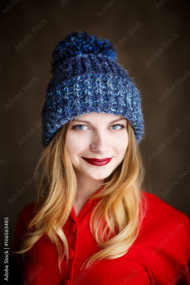 Portrait of playful woman in knitted winter cap Portrait of playful woman in knitted winter cap
