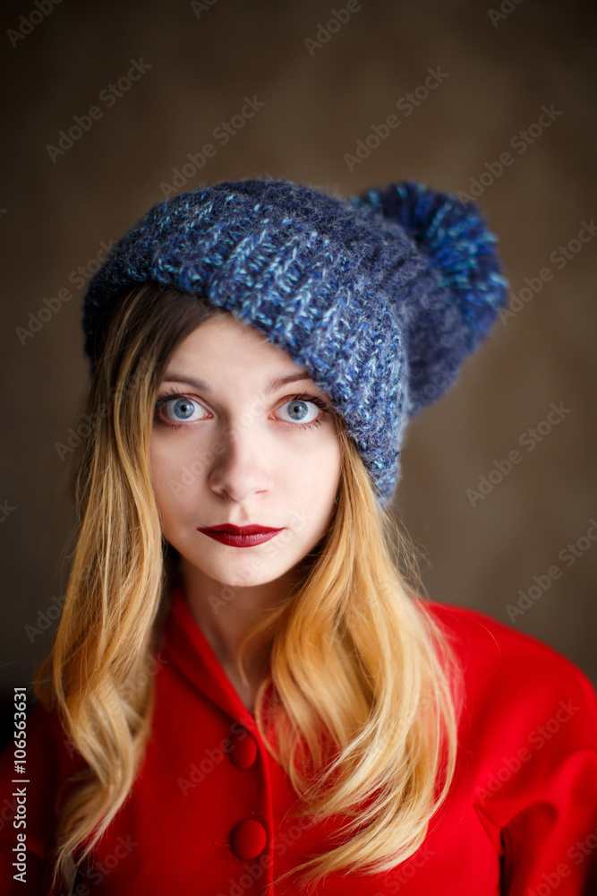 Portrait of playful woman in knitted winter cap Portrait of playful woman in knitted winter cap