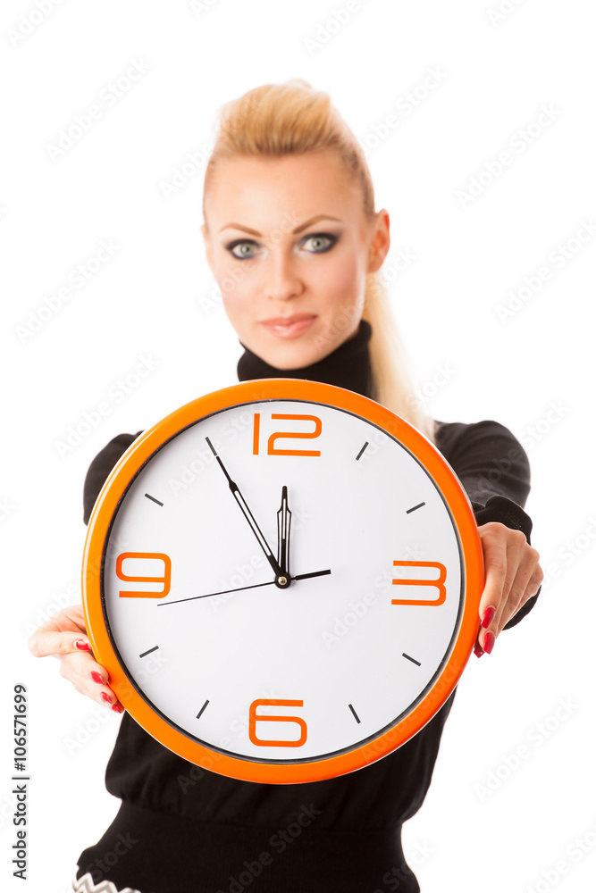 Calm smiling woman with big orange clock gesturing no rush, enou Calm smiling woman with big orange clock gesturing no rush, enou