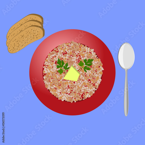 Boiled buckwheat with butter. Bread. Top view