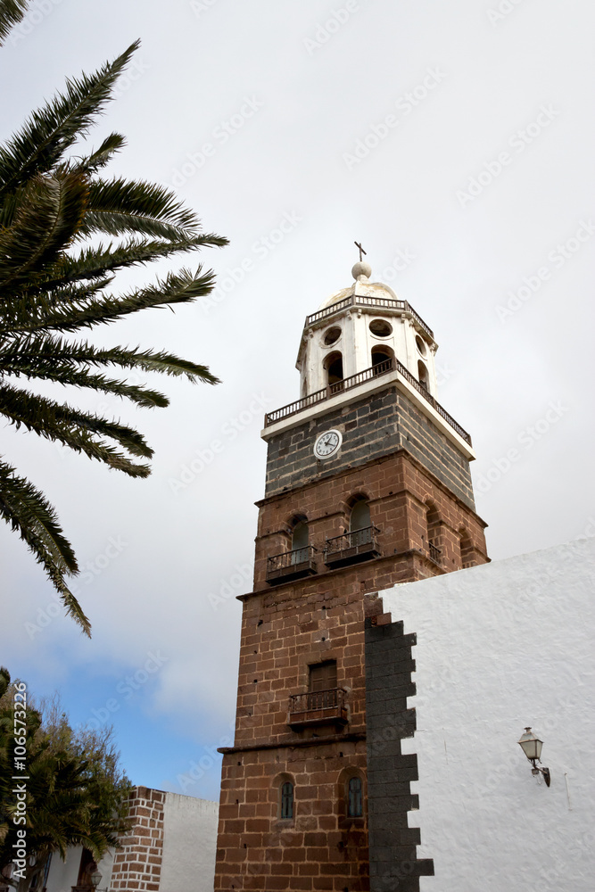 Teguise historical bell tower - Lanzarote. Iglesia de Nuestra Senora de Guadalupe in Plaza Mayor - Canary Islands, Spain

