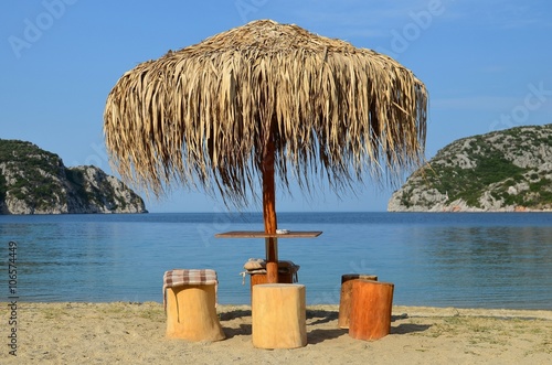 Sun umbrella and stump seats