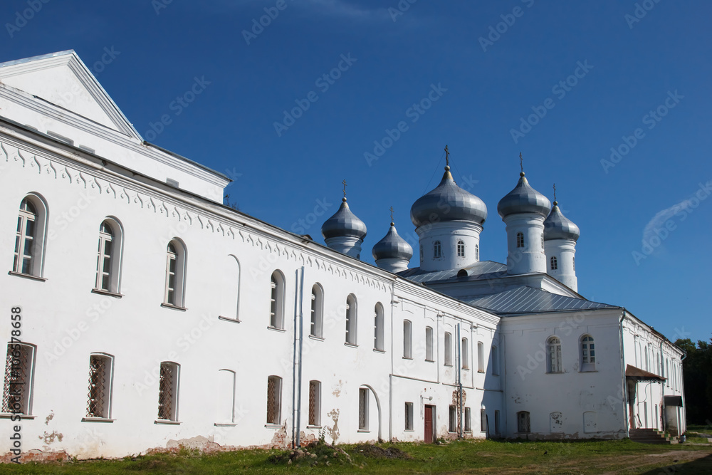 St. George's monastery in sity Veliky Novgorod, orthodox Christian Church, religion of Russia. Monastery's oldest Church buildings in Russia in 1030 year. White Church with blue domes.