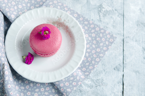 Pink macarons with vanilia cream photo