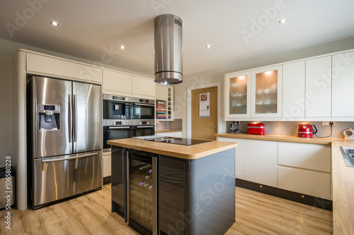 Modern Kitchen with Island high gloss units and rounded corners