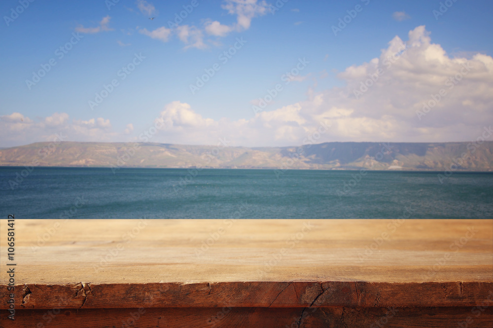 wood deck in front of lake landscape. ready for product display
wood deck in front of lake landscape. ready for product display