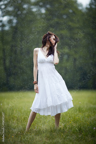 beautiful girl under rain