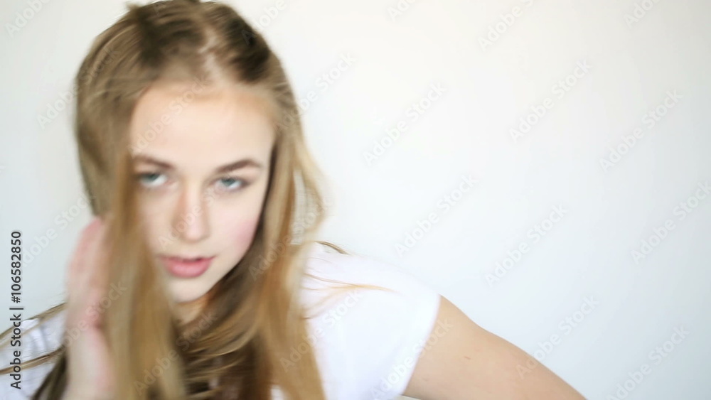 beautiful sexy young girl posing in the studio on a white background beautiful sexy young girl posing in the studio on a white background