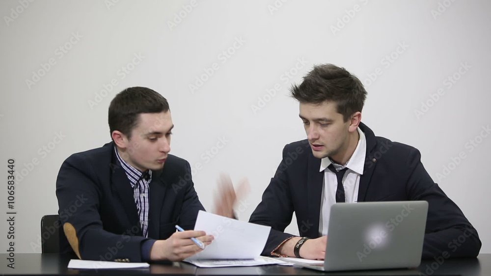 Business confrontation: Businessmen arguing in the office Business confrontation: Businessmen arguing in the office