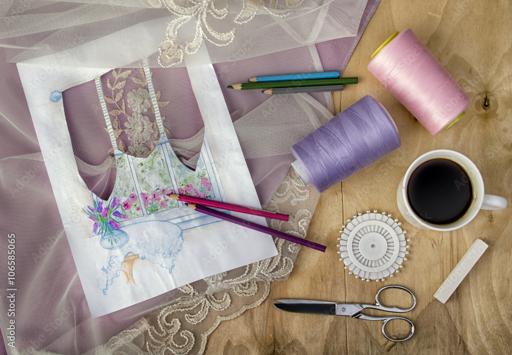 Interior designer’s table with the drawing, materials, accesso