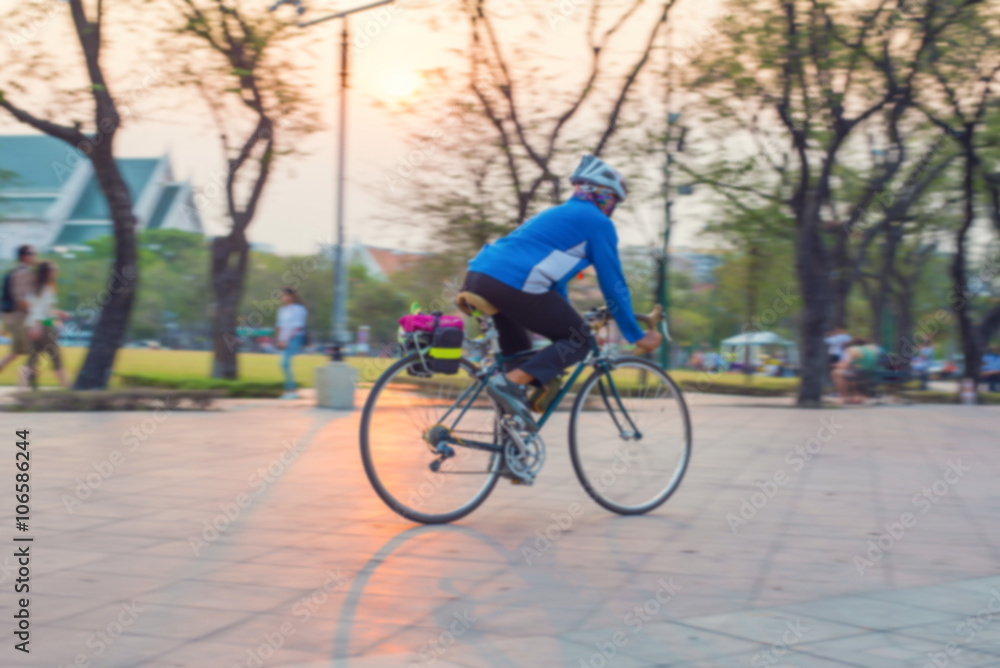 Obraz premium Blurred exercise by bicycling