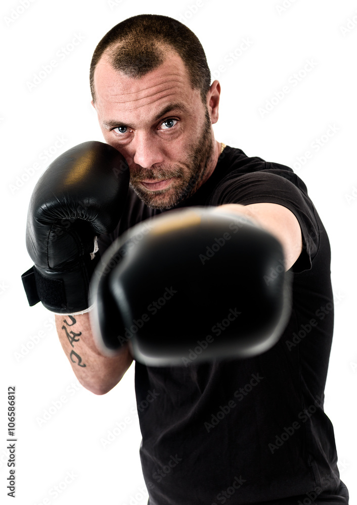 Portrait of male athlete boxer man looking aggressive with boxin Portrait of male athlete boxer man looking aggressive with boxin