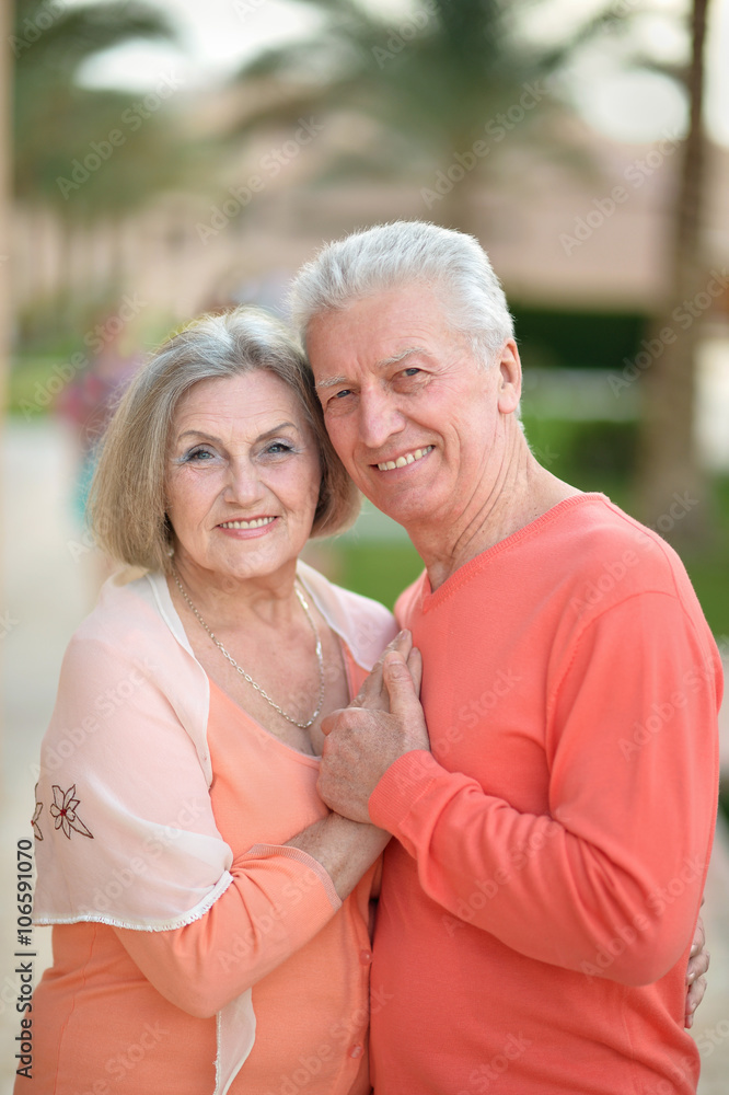 Senior couple near hotel